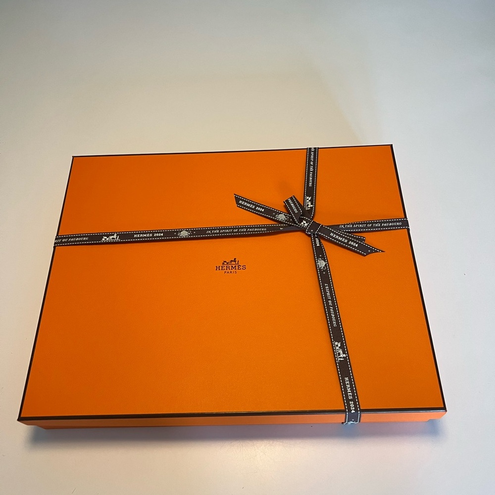Authentic empty Hermes gift box with ribbon